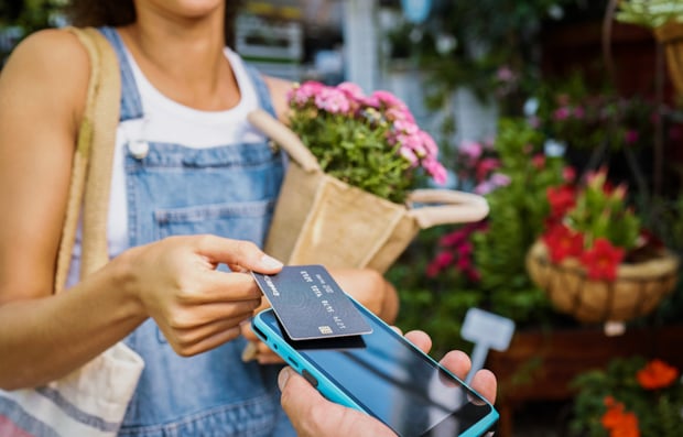Individual using digital wallet to make a purchase.