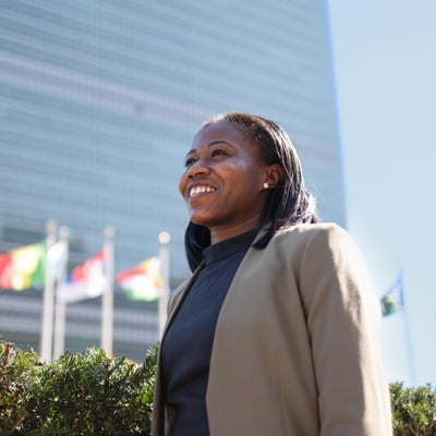 UNFCU staff member outside of the United Nations headquarters.