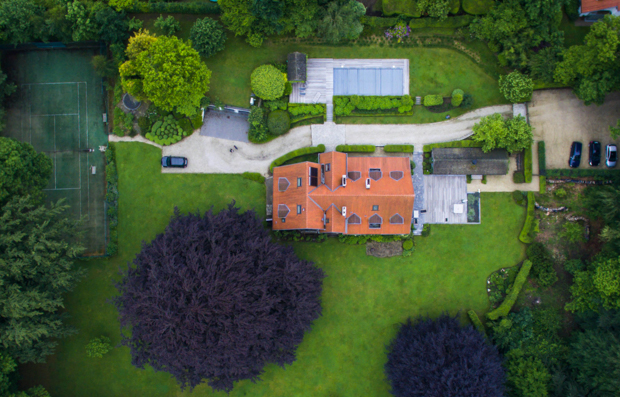 Aerial view of house in nature.